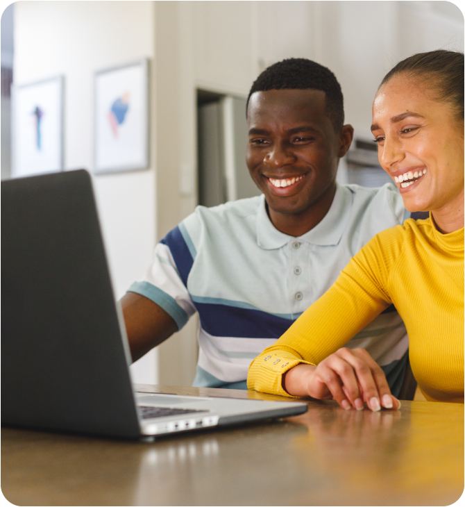 A smiling couple  finding Affordable Care Act (ACA) with Guardian Credit Union's Insurance