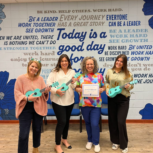 The Guardian Credit Union Foundation's Teach for Tomorrow recipient visit with ukeleles