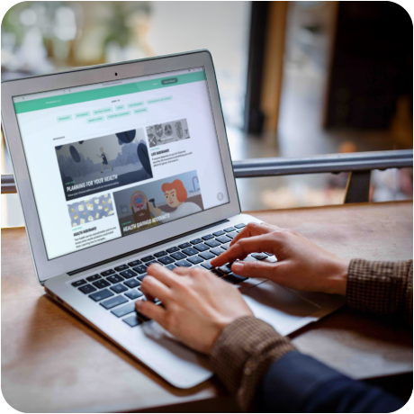 Young woman explores financial literacy with Banzai’s Financial Wellness Assessment at home.