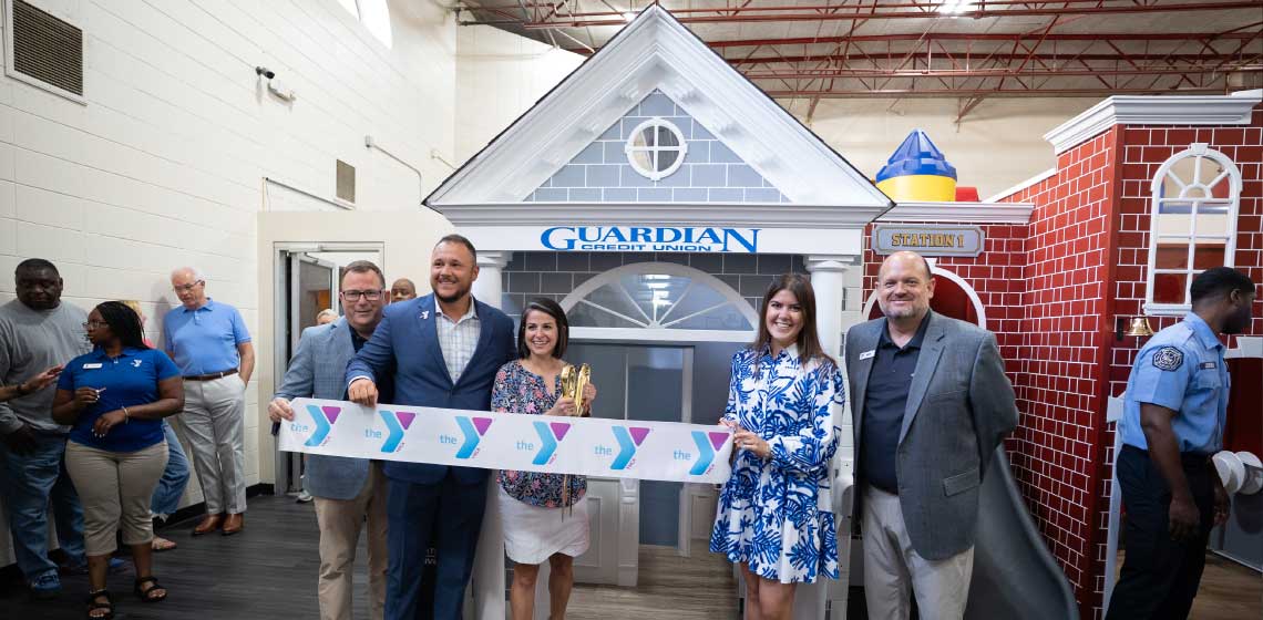 Guardian Credit Union team members supporting the ribbon cutting at the Y-Town in the Bell Road YMCA in Montgomery.