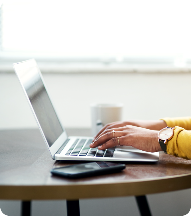 Member securely accessing Guardian Credit Union eStatements online to manage accounts and reduce paper waste