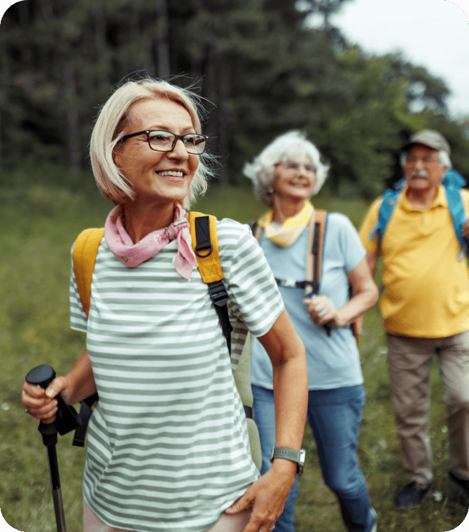 Older adults hiking outdoors Guardian Credit Union’s retirement planning and long-term financial support