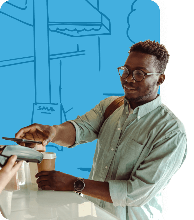 Younger man using smartphone to tap and pay, showcasing Guardian Credit Union’s online and mobile banking convenience