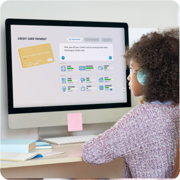 Young girl studying on her home computer about credit card payments and Financial Literacy, thanks to Guardian’s partnership with Banzai.