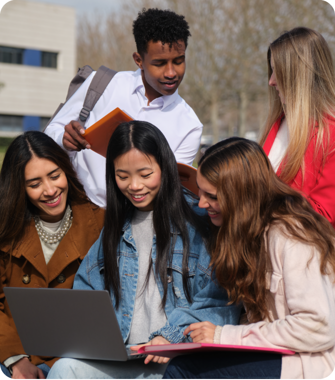 Students outside on campus applying for the Guardian Scholarship Program