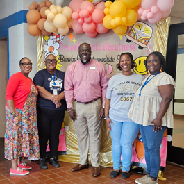 Guardian Credit Union team members helping at a Financial Literacy community event at local school.