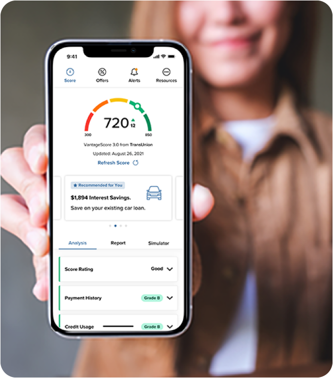Person holds phone showing Guardian CU credit score app for financial wellness and real-time insights