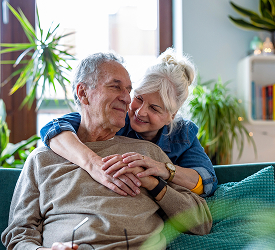 Happy older couple relaxing at home, representing Guardian Credit Union’s home equity loans and flexible HELOC options