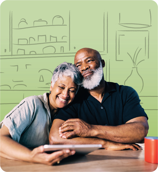 Happy older couple using laptop to view Guardian CU High-Yield Savings and manage financial goals.