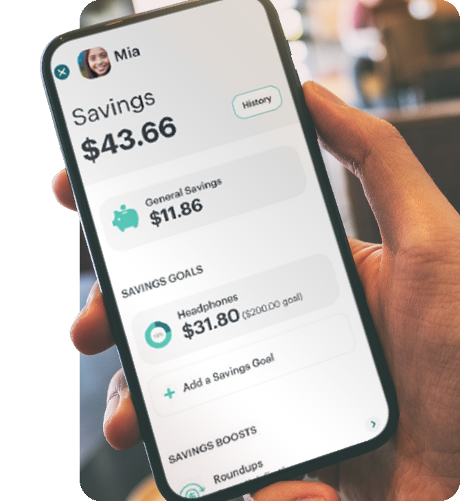 Greenlight app on phone showing child’s Spending summary and budget categories