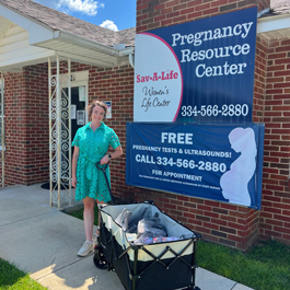 Guardian Credit Union team member helping at a Pregnancy Resource Center community event.