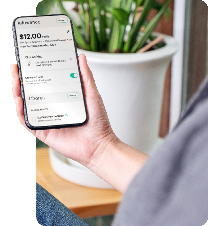 Greenlight app on phone showing child’s Spending summary and budget categories