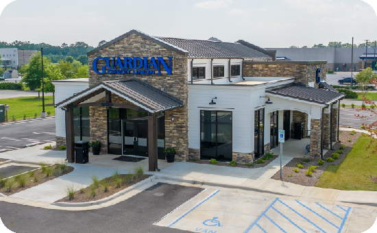 Exterior view of Guardian Credit Union’s Wetumpka branch building, with visible parking lot.